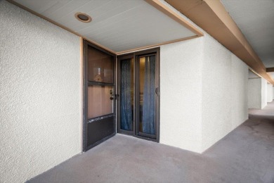 Easy beach access from this updated ground floor condominium at