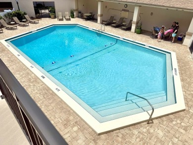 Easy beach access from this updated ground floor condominium at