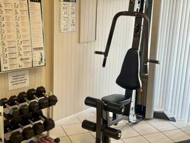 Easy beach access from this updated ground floor condominium at