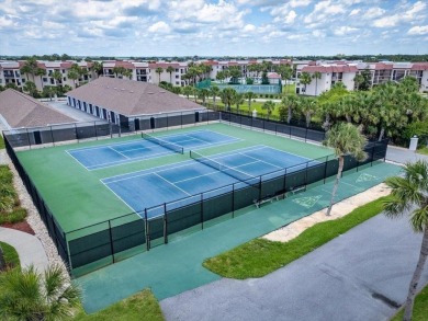 Easy beach access from this updated ground floor condominium at