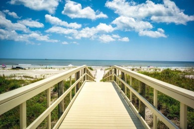 Easy beach access from this updated ground floor condominium at