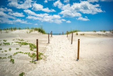 Easy beach access from this updated ground floor condominium at