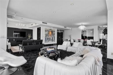 This exceptional 3-bedroom, 4-bath residence at the prestigious