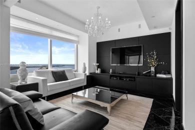 This exceptional 3-bedroom, 4-bath residence at the prestigious