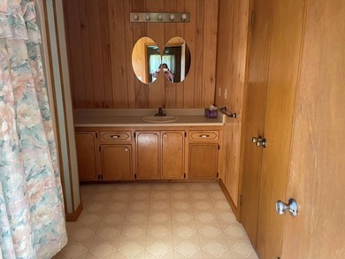 Peaceful country home on 16.2 acres, small pond and many other