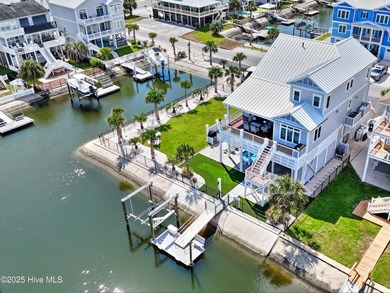 Coastal Luxury Canal-Front Beach House! Welcome to this stunning
