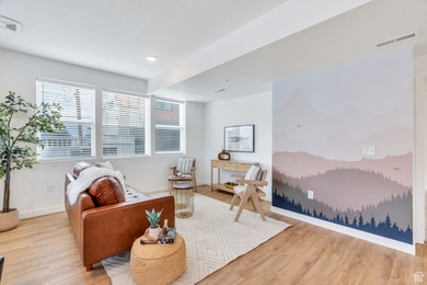 Experience this homes impeccable location in Daybreak's vibrant