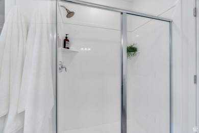 Experience this homes impeccable location in Daybreak's vibrant