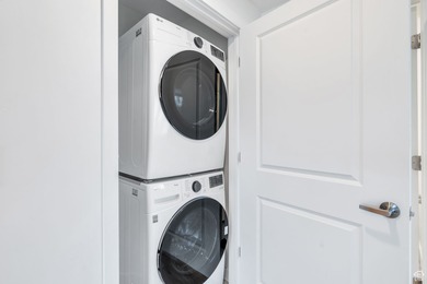 Experience this homes impeccable location in Daybreak's vibrant