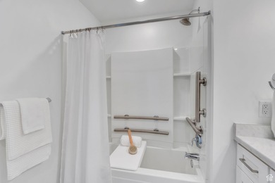 Experience this homes impeccable location in Daybreak's vibrant