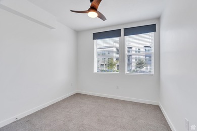 Experience this homes impeccable location in Daybreak's vibrant