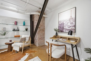 Located in the boutique One Ecker Lofts, a historic conversion