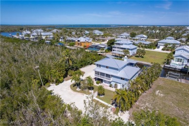 Nestled in the tranquil fishing community of Bokeelia on Pine