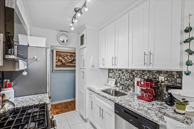 Experience elegant living in this beautifully updated