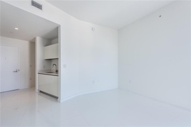 Welcome to this 19th floor corner unit boasting bay views and