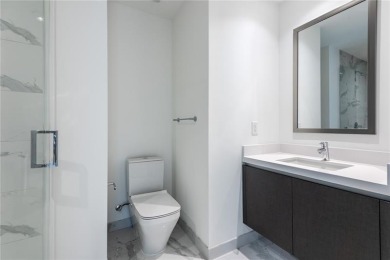 Welcome to this 19th floor corner unit boasting bay views and