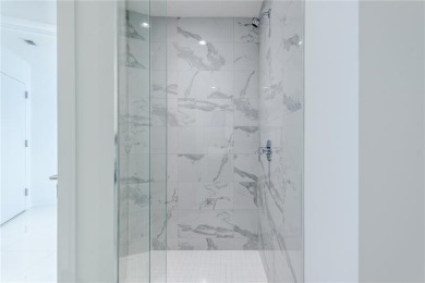 Welcome to this 19th floor corner unit boasting bay views and