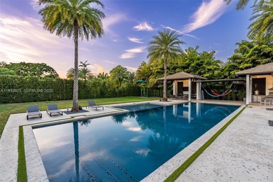 Upon entry, a breathtaking resort-style pool with Bali-inspired