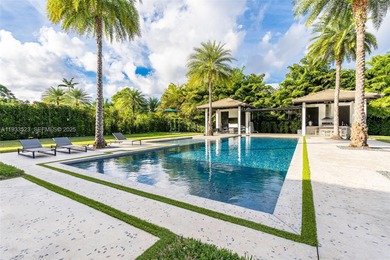Upon entry, a breathtaking resort-style pool with Bali-inspired