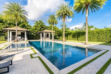 Upon entry, a breathtaking resort-style pool with Bali-inspired