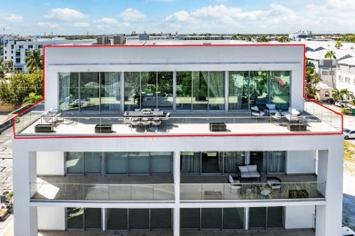 This exceptional just-completed penthouse at Aria offers a rare