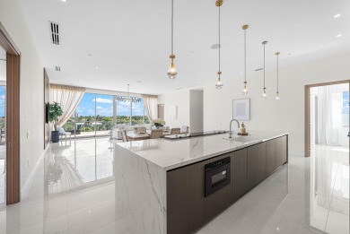 This exceptional just-completed penthouse at Aria offers a rare