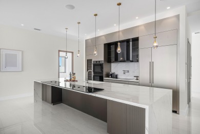 This exceptional just-completed penthouse at Aria offers a rare