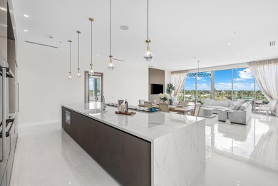 This exceptional just-completed penthouse at Aria offers a rare