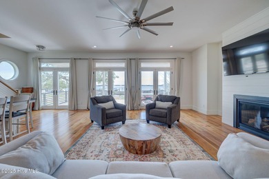 This meticulously crafted waterfront estate, built in 2020