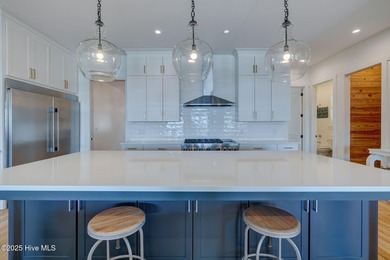 This meticulously crafted waterfront estate, built in 2020