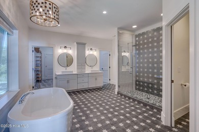 This meticulously crafted waterfront estate, built in 2020