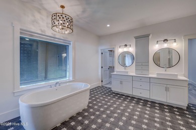 This meticulously crafted waterfront estate, built in 2020