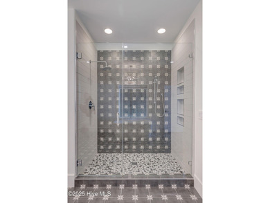 This meticulously crafted waterfront estate, built in 2020