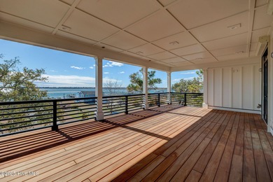 This meticulously crafted waterfront estate, built in 2020