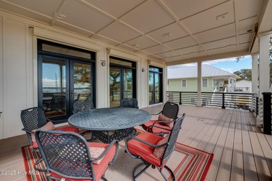 This meticulously crafted waterfront estate, built in 2020