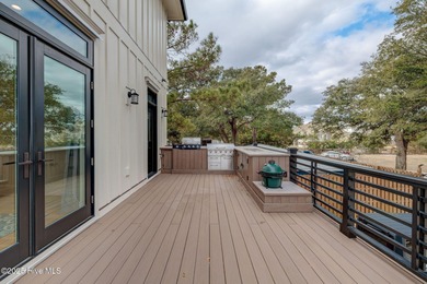 This meticulously crafted waterfront estate, built in 2020