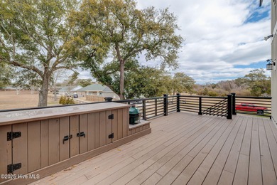 This meticulously crafted waterfront estate, built in 2020