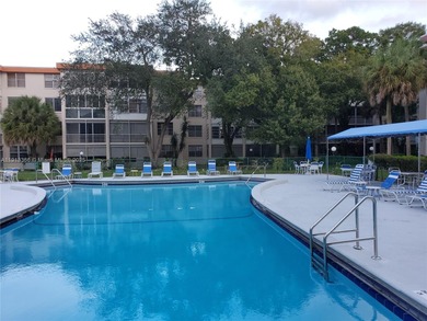 Partially remodeled 1BR/1BA with screen large patio condo in