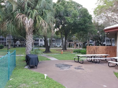 Partially remodeled 1BR/1BA with screen large patio condo in