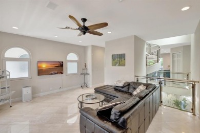 Newly priced! This gorgeous three level townhome located in an