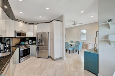 Newly priced! This gorgeous three level townhome located in an