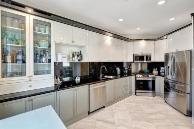 Newly priced! This gorgeous three level townhome located in an