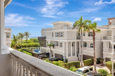 Newly priced! This gorgeous three level townhome located in an