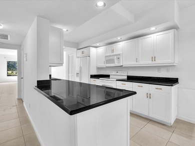 Live your best life in this beautifully updated Delray Beach 1st