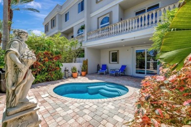 Newly priced! This gorgeous three level townhome located in an