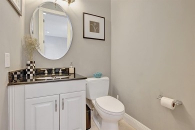 Newly priced! This gorgeous three level townhome located in an