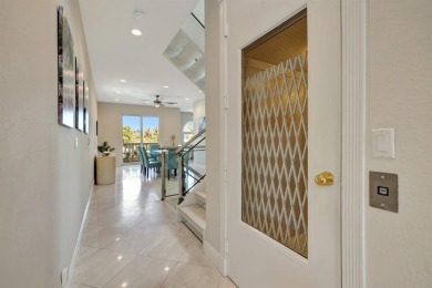 Newly priced! This gorgeous three level townhome located in an