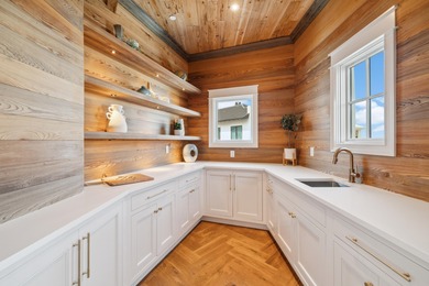 Expertly crafted by Old Seagrove Homes, this exceptional