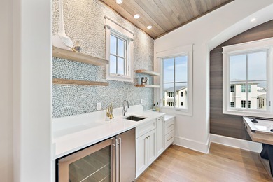 Expertly crafted by Old Seagrove Homes, this exceptional