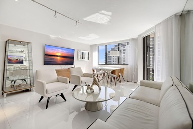 Experience Brickell Key living in this modern fully renovated 2